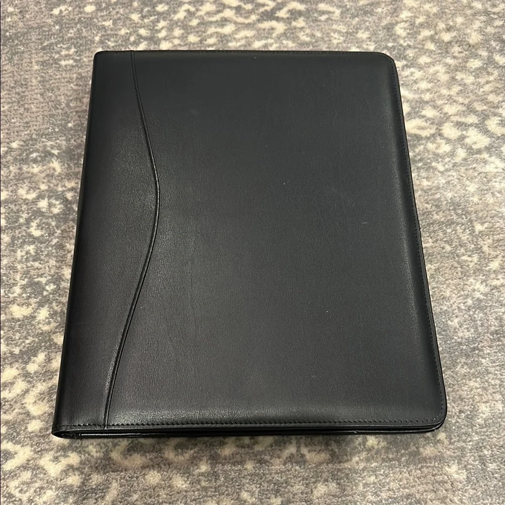 Black folder for paper pen and accessories. Legal size.